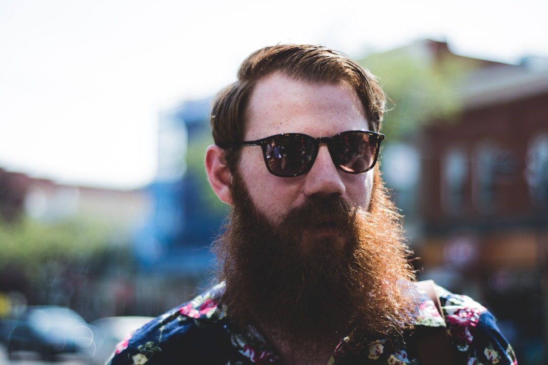 Portrait of a bearded man with glasses, forum founder