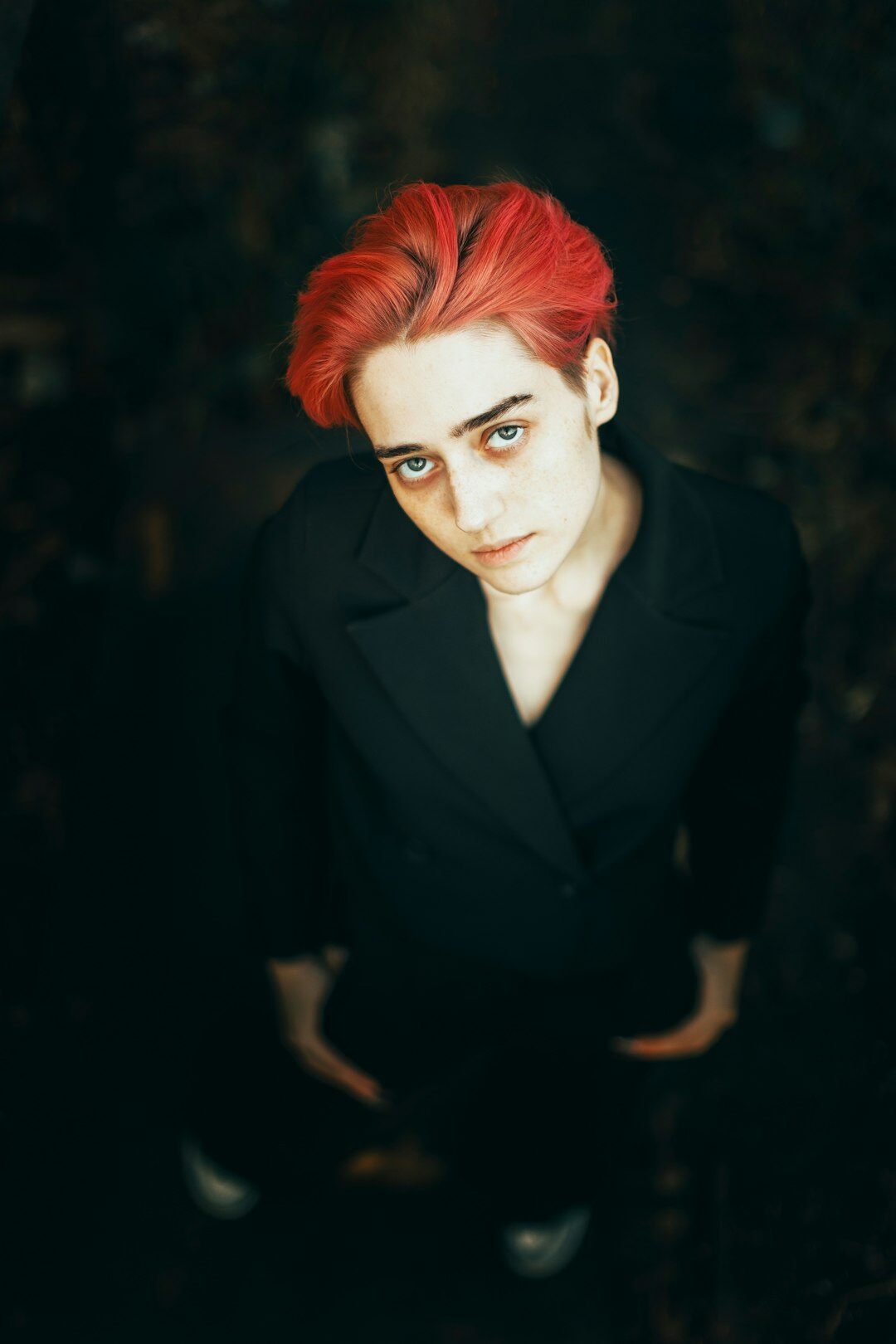 Portrait of a professional woman with short red hair